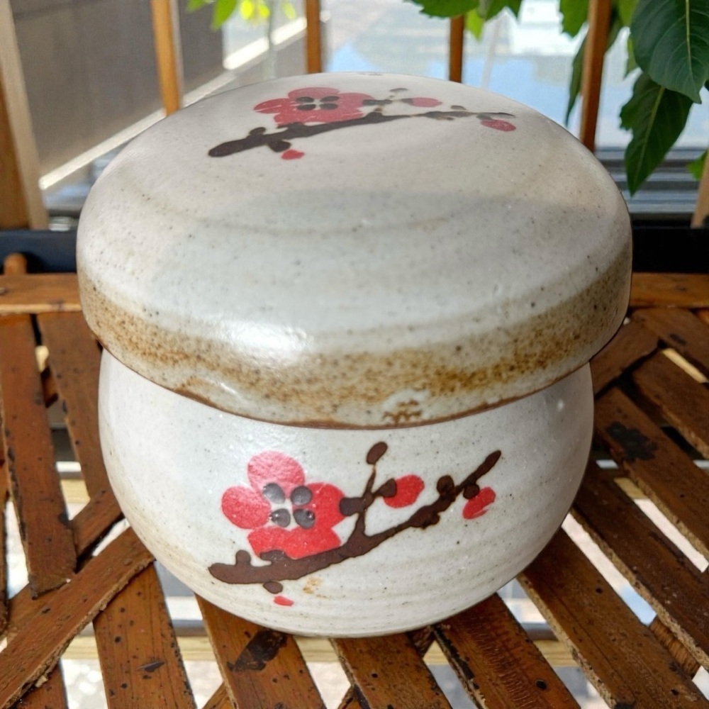Artisan-made ceramic tea cup with infuser, lid, apricot flower Rustic Pottery